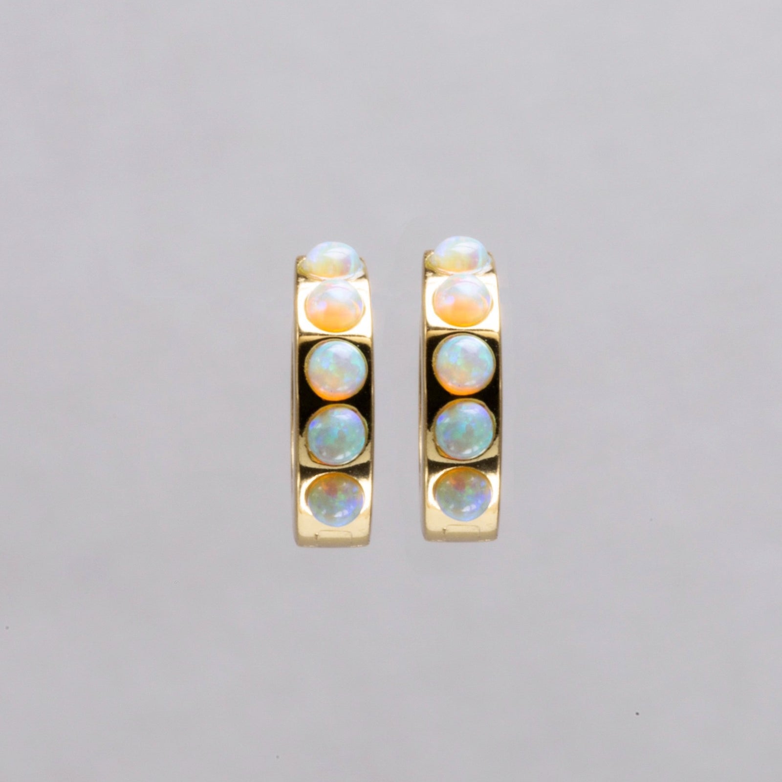 Gold plated silver hoop earrings with line opals