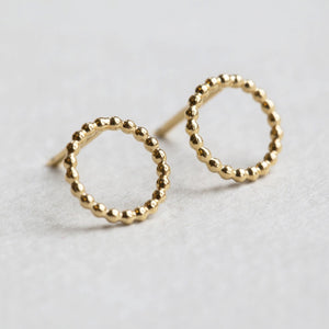 Yoriko's circle studs close up