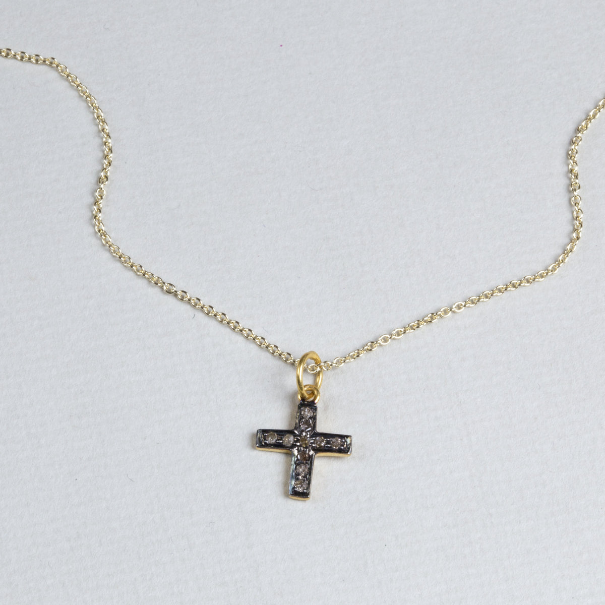 With a gold chain - sold separately