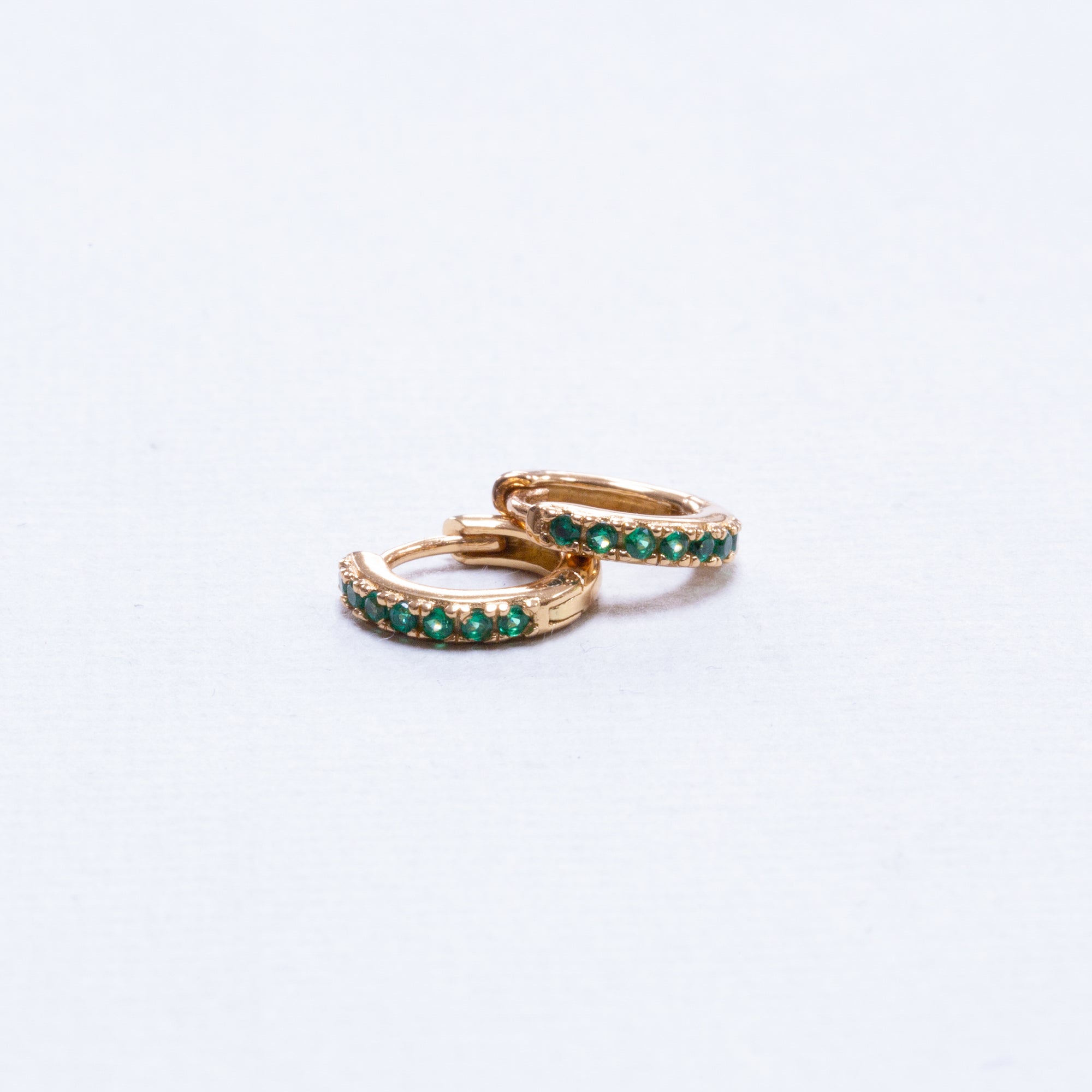 Huggie Hoop Earrings with Green Cubic Zirconia