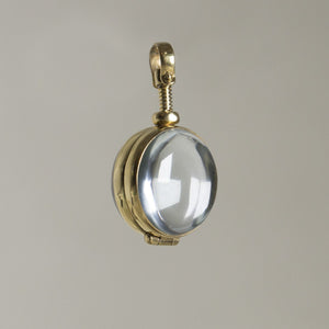 the intriguing mechanism of the glass cabochon locket from up close