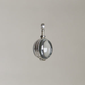 the intriguing mechanism of the glass cabochon locket from up close