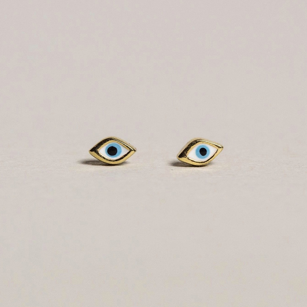 fantastic 'evil eye' micro studs brilliant for multi-pierced! 