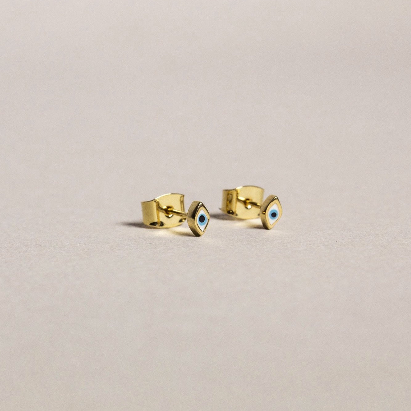 fantastic 'evil eye' micro studs brilliant for multi-pierced! 