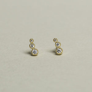 goregeous thre crystal dots in vivid gold plated setting will enchant everyone