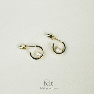 small but revelatory - lovely subversive pearl earrings