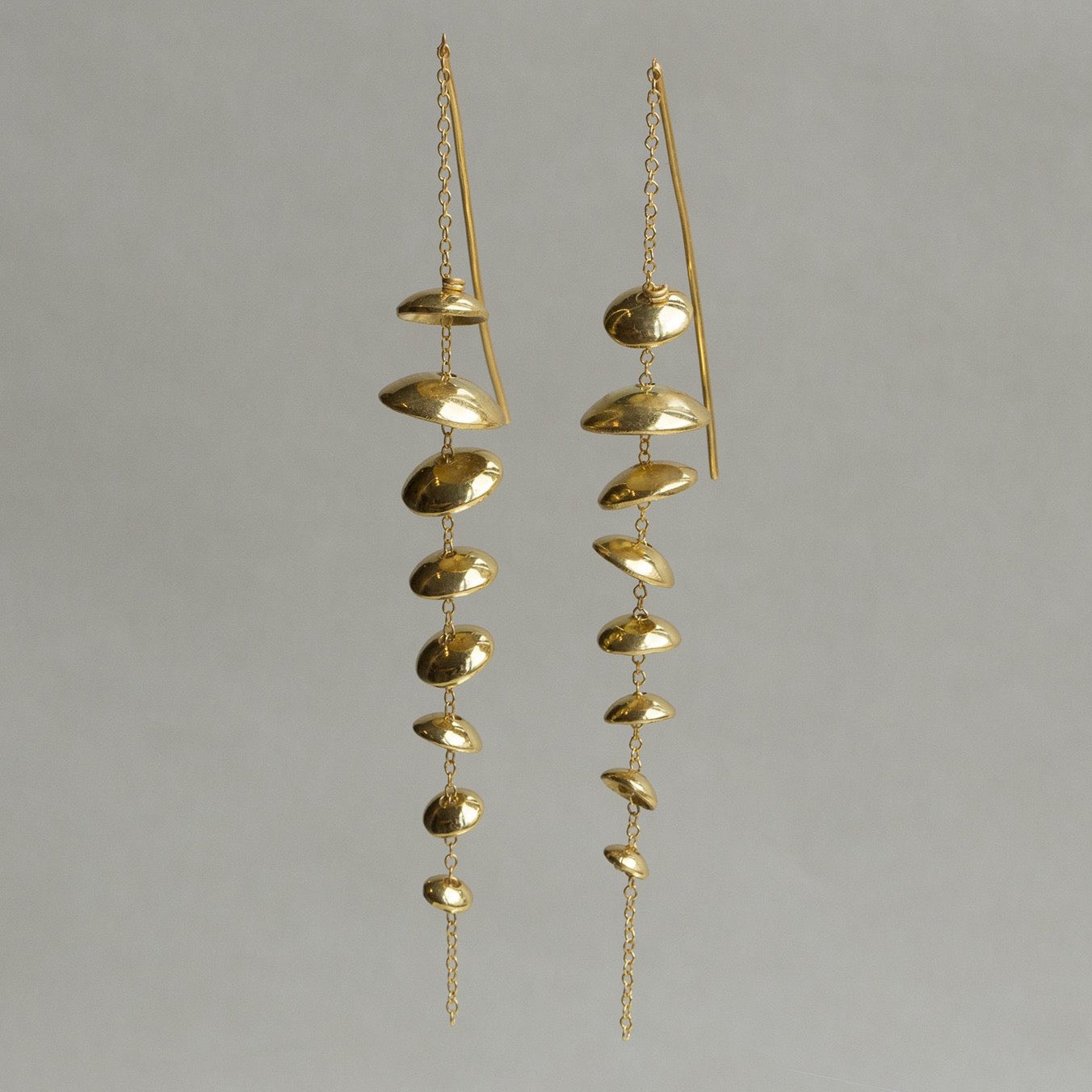 our sexy floating discs earrings