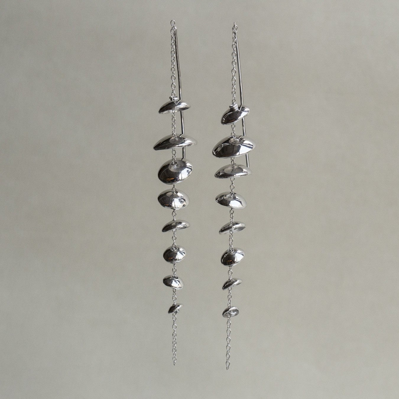 our sexy floating discs earrings