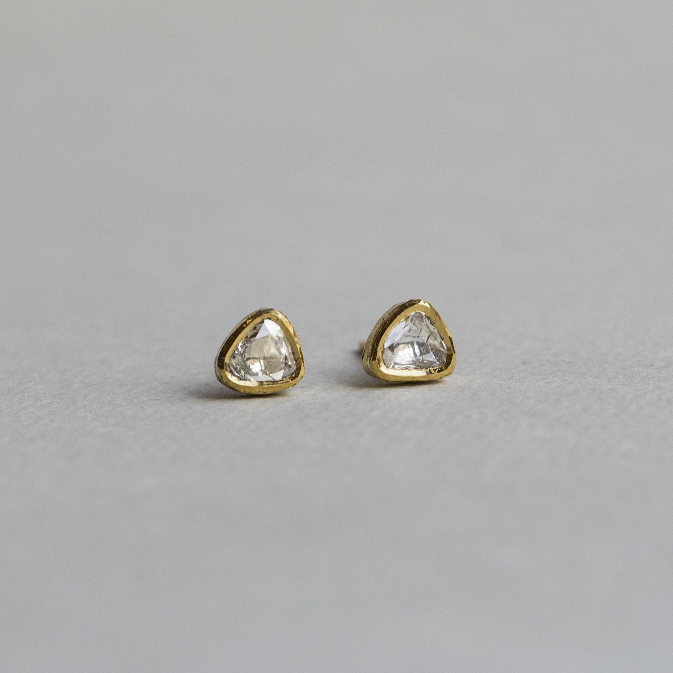 the foiled backs enhance the naturally shimmery rose cut diamonds 