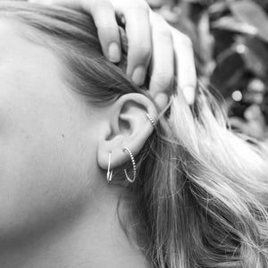 pictured on model from left: felt safety pin drop earrings, Yoriko Mitsuhashi large beaded hoop and small beaded hoop, all avaialble at feltlondon.com