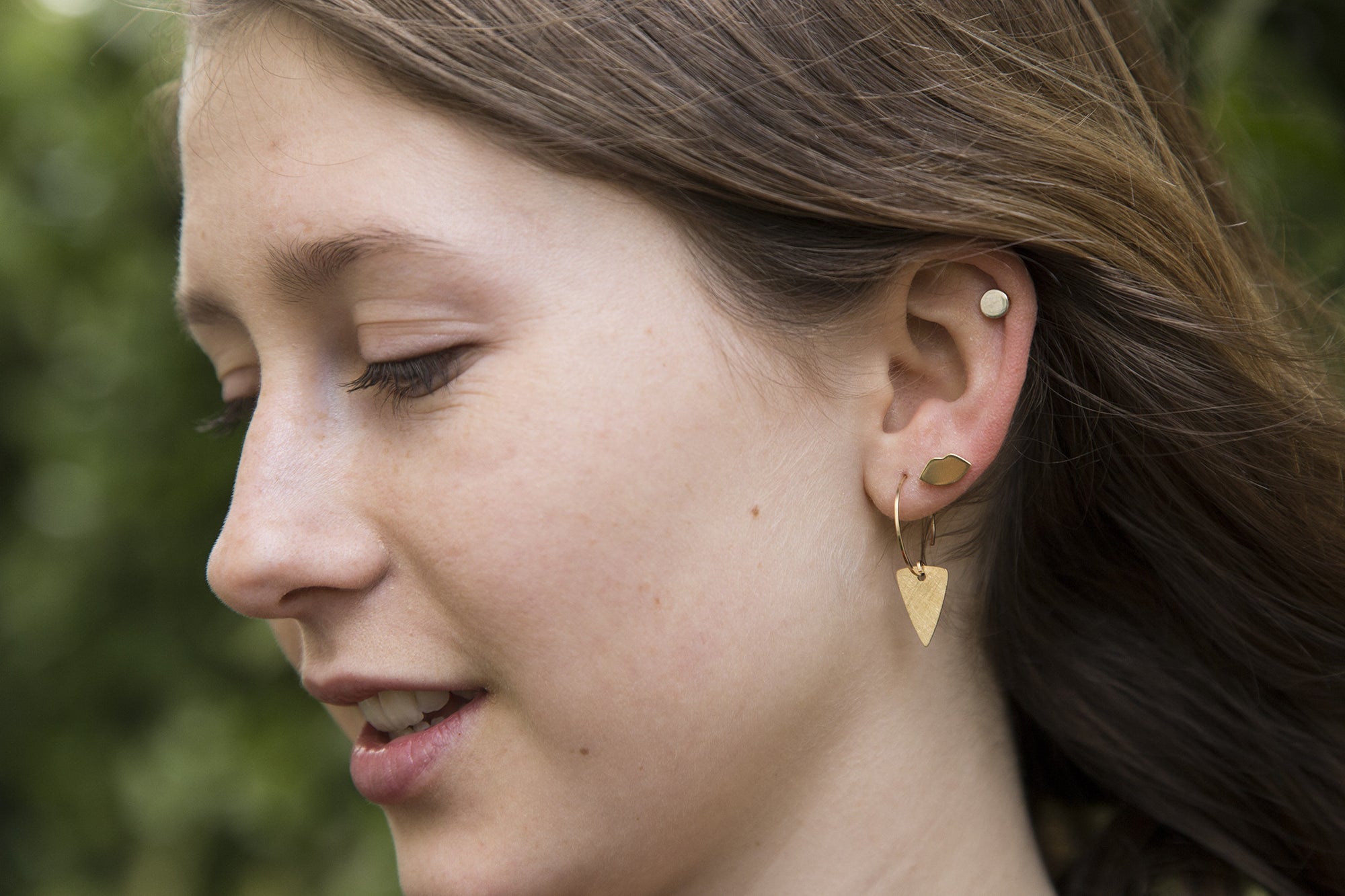 soft but striking arrow head charm hoops