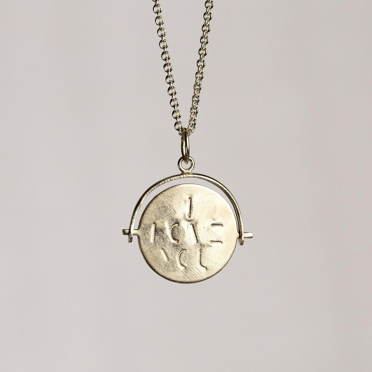 Vintage spinning I love you charm necklace with 9ct gold trace chain