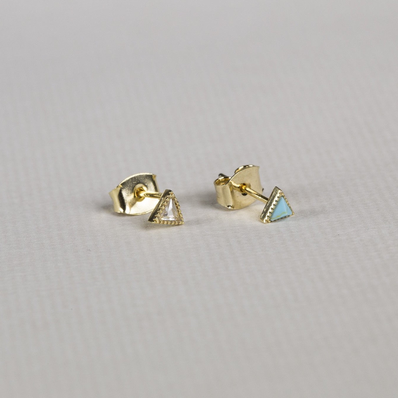 bright and sparkly mini triangle studs in most delicious colours