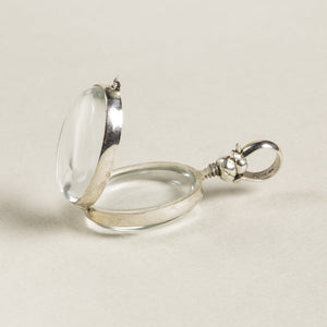 opened oval locket seen from the side - same screw design is used in the round lockets