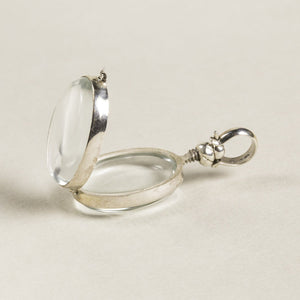 opened oval locket seen from the side - same screw design is used in the round lockets
